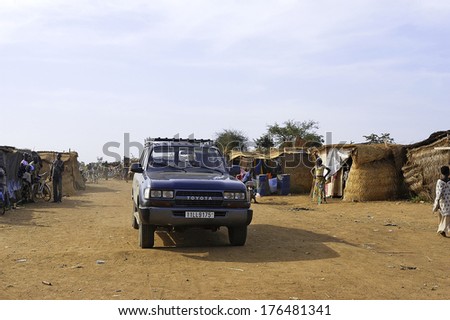 KOUPELA, BURKINA FASO - NOVEMBER 11 : a car belonging to gold prospectors French car parked in the middle of a wild African gold mine in Burkina Faso, november 11, 2010