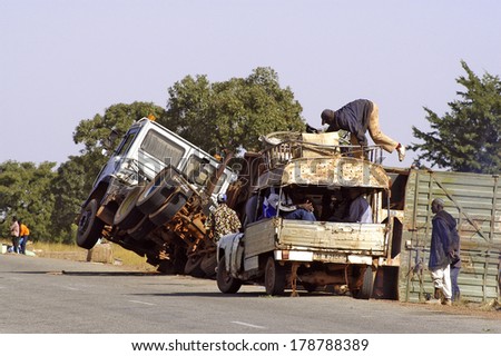 KOUPELA, BURKINA FASO - JANUARY 3: traffic accident in Africa on the highway between a truck and a car, january 3, 2008.