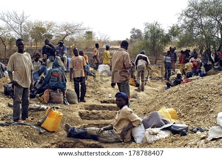 BOLOGO, BURKINA FASO - JANUARY 11: Row of holes to test the gold content of the mine and find a gold vein in a quartz vein, january 11, 2008.