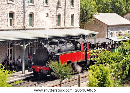 ANDUZE, FRANCE - JULY 14 : The steam from the small tourist train from Anduze prepares for his trip to do in Saint-Jean-du-Gard, July 14, 2014.