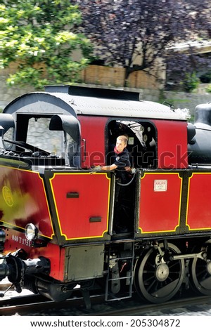 ANDUZE, FRANCE - JULY 14 : The steam from the small tourist train from Anduze prepares for his trip to do in Saint-Jean-du-Gard, July 14, 2014.