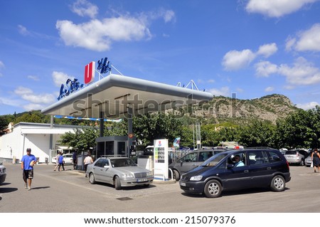 ANDUZE, FRANCE - AUGUST 24 : Service station on a French supermarket car park where the prices are generally lower than in a normal station, august 24, 2014.