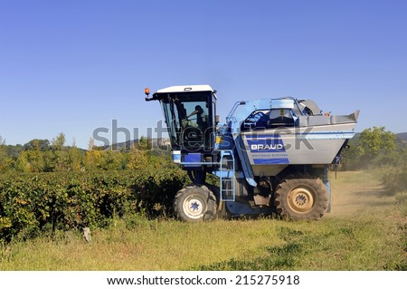 TORNAC, FRANCE - SEPTEMBER 2: The harvest with machines to harvest the grapes in France in the department of Gard, september 2, 2014.