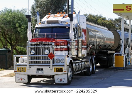 AUSTRALIA - MAY 20: A large Australian truck delivering fuel at a petrol station in Australia, may 20, 2007.