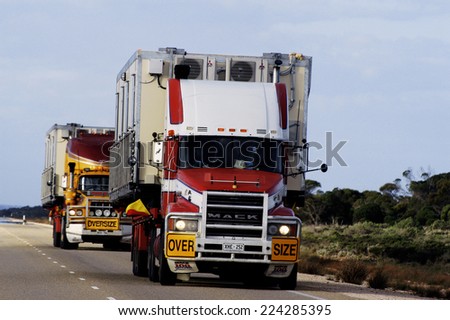 AUSTRALIA - MAY 19: A large Australian truck at full speed on a country road in Australia, may 19, 2007.