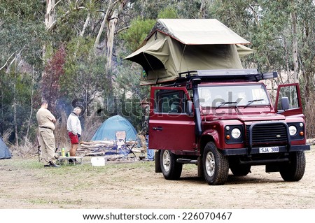 AUSTRALIA - APRIL 22 : All-terrain vehicle equipped for camping with a tent on the roof handy for sleep safely, April 22, 2007.