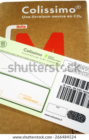 TORNAC, FRANCE - MARCH 23: Mailing carton sold by the French Post for sending in France and followed by bar code with an insurance in case of loss, march 23, 2015.