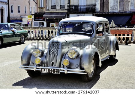 ALES, FRANCE - APRIL 11: Citroen front-wheel Drive gray photographed vintage car rally Town Hall Square in the town of Ales, April 11, 2015.