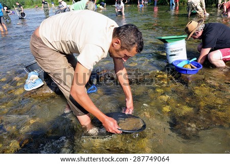 CARDET, FRANCE - MAY 24: Gold prospectors in full competition for the European Cup in France gold panning in the river Gardon located in the department of Gard, May 24, 2015.