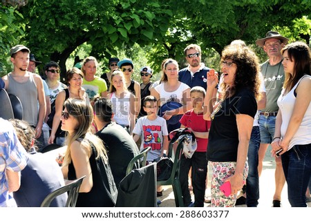 CARDET, FRANCE - MAY 25: Treasure hunt organized in a French campsite to amuse and occupy campers. The instructions are given before departure, may 25, 2015.