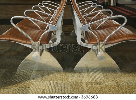 Abstract image of stylish designed waiting room seating at an airport.