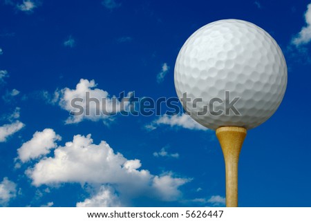Golf Ball & Tee on the right with clouds and sky background.