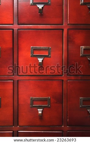 Lustrous Wooden Card File Cabinet in Dramatic LIght