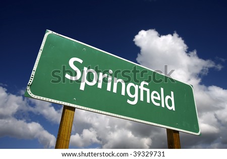 Springfield Road Sign with dramatic blue sky and clouds - U.S. State Capitals Series.