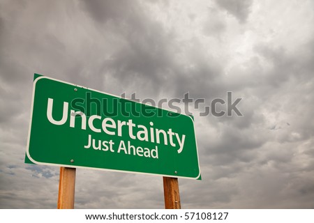 stock-photo-uncertainty-just-ahead-green-road-sign-with-dramatic-storm-clouds-and-sky-57108127.jpg