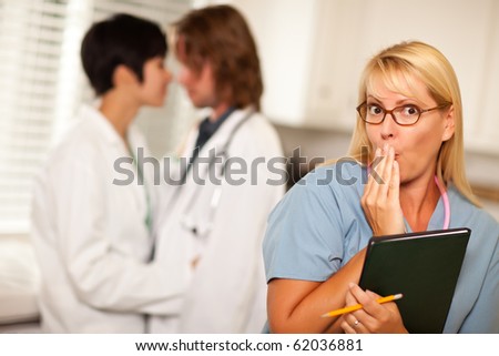 Alarmed Medical Woman Witnesses Her Colleagues Inner Office Romance Display.