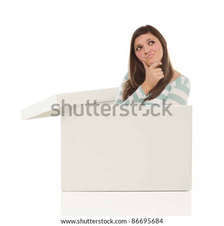 Attractive Ethnic Female Popping Out and Thinking Outside The Box Isolated on a White Background.