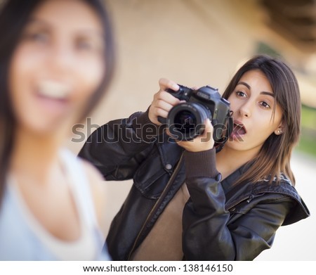 Excited and Ready Female Mixed Race Photographer Spots Celebrity Outside.
