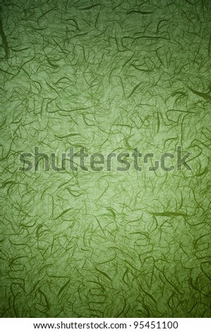 Green background with pattern and lens vignetting. (vertical)