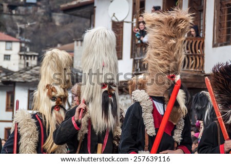 SHIROKA LAKA, BULGARIA - MARCH 01, 2015 - Kukeri mask festival and masquerade games 01 March 2015. Bulgarian traditional dances and costumes called Kukeri.