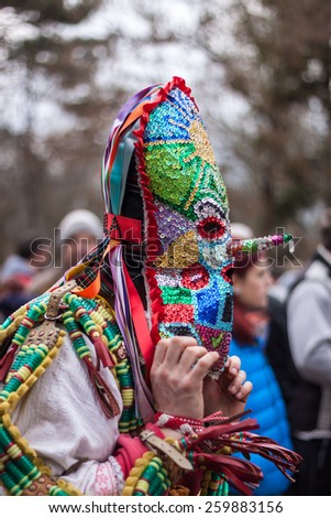 YAMBOL, BULGARIA - MARCH 08, 2015 - Kukerlandia - mask festival and masquerade games 08 March 2015. Bulgarian traditional dances and costumes called Kukeri.