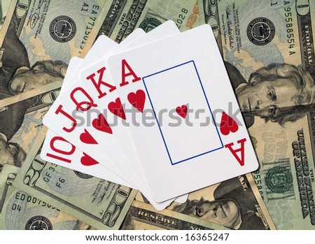Royal flush in hearts on top of US cash