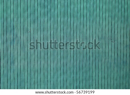 green insulation material wrapped around the exterior of house, great background