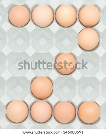 letter z  from the eggs,Eggs in paper tray isolated on white