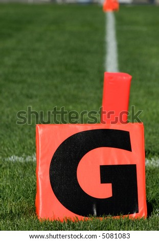 Orange Football Goal Marker at End Zone
