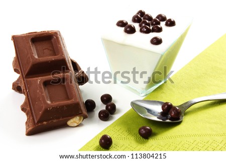 yogurt on a white background with finger chocolate
