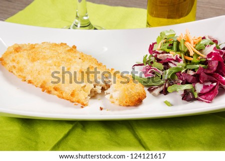 breaded fish fingers and salad