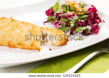 breaded fish fingers and salad