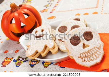 halloween cookies in the shape of ghost and skull