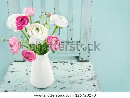 White And Pink Flowers On Light Blue Vintage Chair