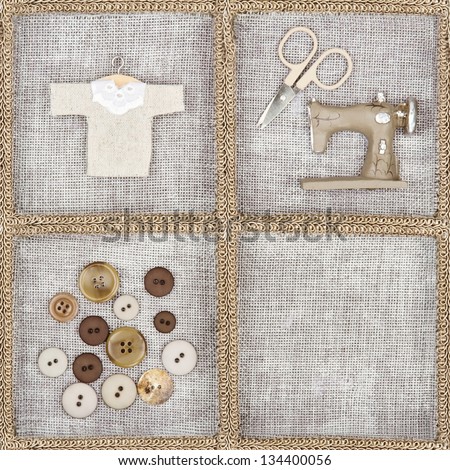 Sewing items - scissors, sewing machine, buttons, shirt - on rustic linen background