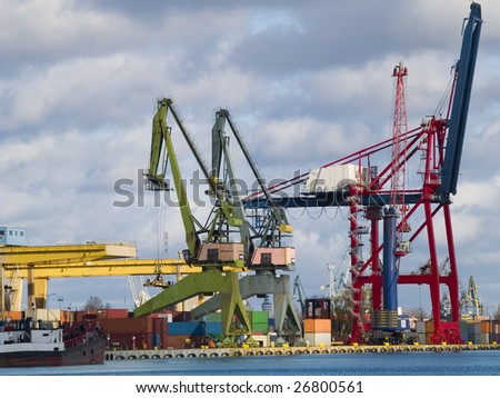 Gantry cranes and containers in a harbor