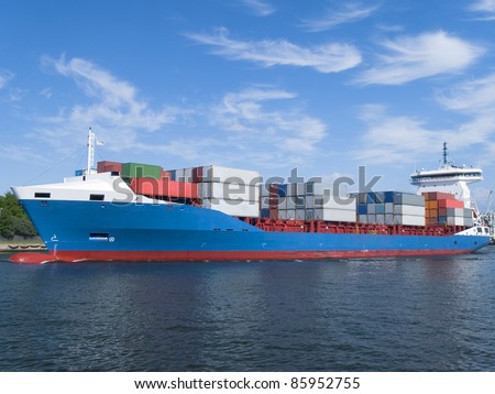 Huge container cargo ship heading for port