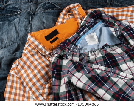 plaid shirt and denim jeans as a background