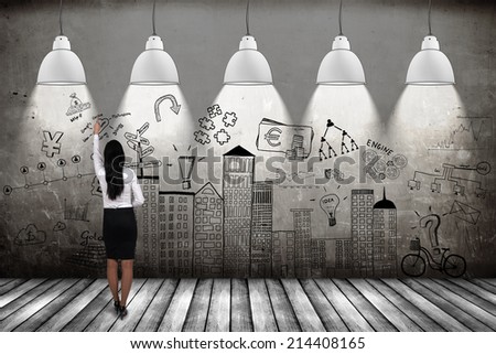 business woman showing business concept on wall