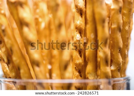 pile of salted sticks in a glass