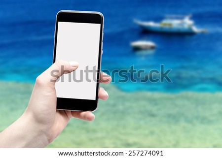 screen phone isolated on a background of the sea