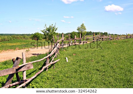 old fence on field