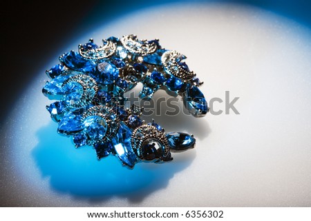 Jewelry in blue tint. High contrast.