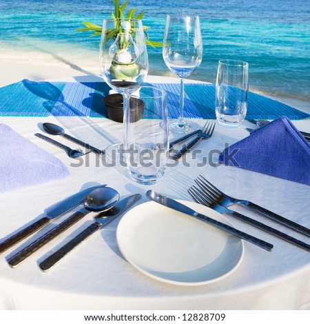 stock photo Table setting at beach restaurant