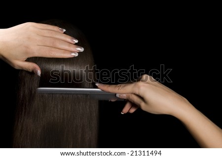 Woman with natural brown hair on black