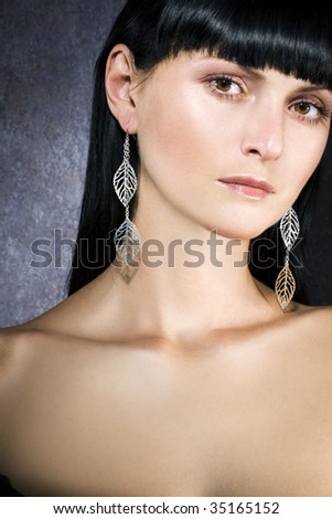 Portrait of woman with silver earrings