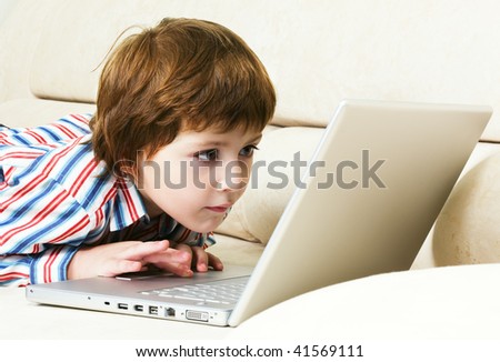Little boy discovers new technology