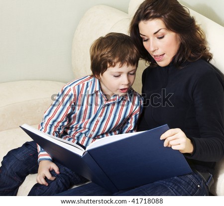 Mother reading to her child an interesting story