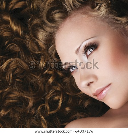 Lifestyle Stock-photo-woman-with-beautiful-makeup-and-long-curly-hair-64337176