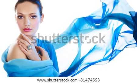 Beautiful woman with ring and blue color scarf